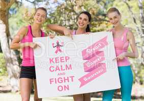 Keep calm and fight on text and pink breast cancer awareness women holding card