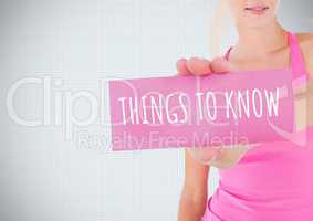 Things to Know Text and Hand holding card with pink breast cancer awareness woman