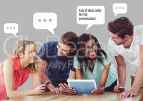People discussing presentation on tablet with chat bubbles