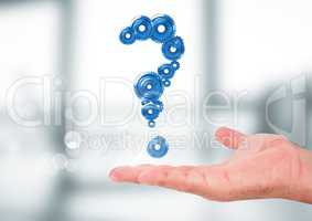 Hand holding question mark made of cogs