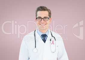 Doctor man with breast cancer awareness ribbon