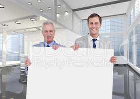 Business men holding blank card in office