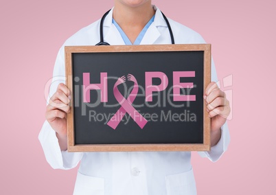 Doctor holding a blackboard with a breast cancer awareness ribbon