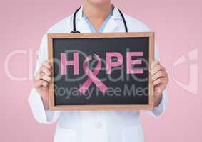 Doctor holding a blackboard with a breast cancer awareness ribbon