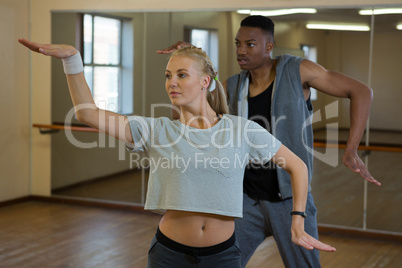 Female dancer with friend rehearsing