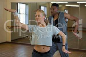 Female dancer with friend rehearsing