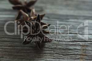 Star anises on wooden table