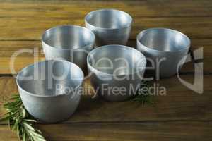 Plastic bowls and rosemary herb