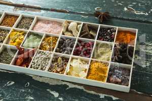 Various spices on wooden table