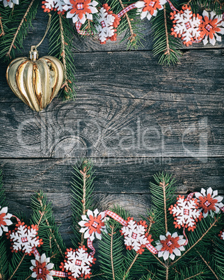 Christmas gray wooden background with toys and a garland