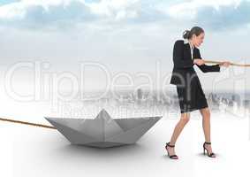 Businesswoman pulling paper boat with rope in city