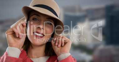 Woman wearing hat in city