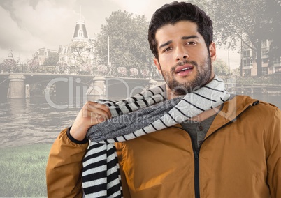 Man wearing scarf and coat in city