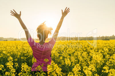 Female Woman Athlete Runner Celebrating In Yellow Flowers