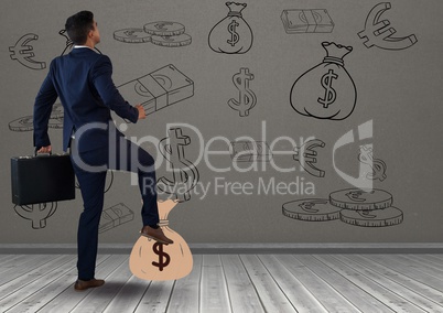 businessman in front of money on wall