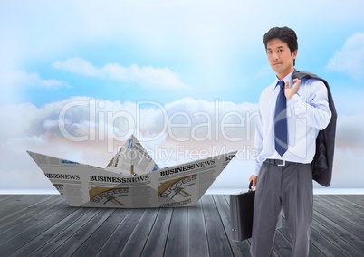 Paper boat with businessman in sky