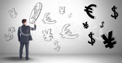 Man drawing money on wall