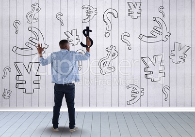 man in front of money on wall touching wall