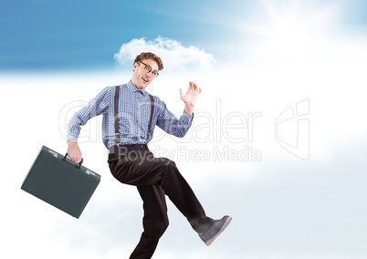 Businessman with briefcase in clouds