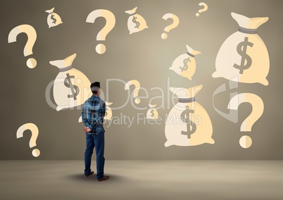 man in front of money on wall