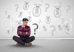 man sitting on ground in front of money on wall