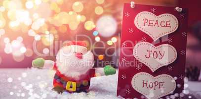 Christmas label with messages and santa claus on snow