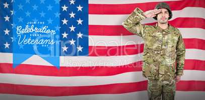 Composite image of portrait of confident soldier giving salute
