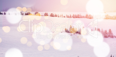 Defocused lights against snow covered land