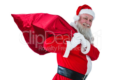 Santa Claus holding christmas bag