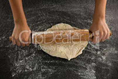 Hand baking dough with rolling pin