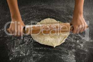 Hand baking dough with rolling pin