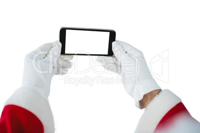 Hands of Santa Claus holding mobile phone