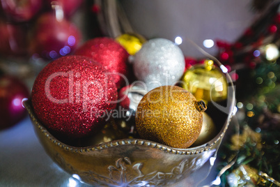 Close-up of christmas bauble in bowl