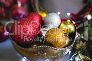 Close-up of christmas bauble in bowl
