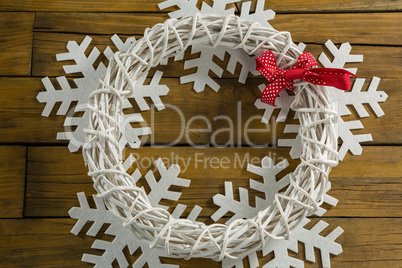 Close up of wreath decoration on artificial snow flake