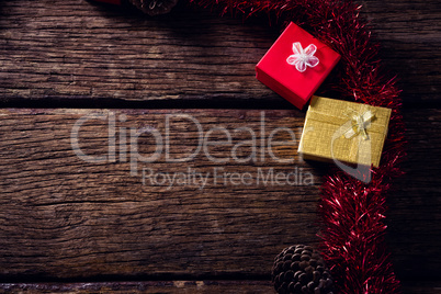 Christmas decoration and gift boxes on wooden table