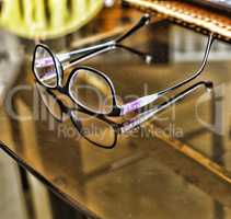 Glasses on a desk in the office.