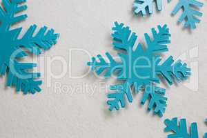 Blue snowflakes on white background