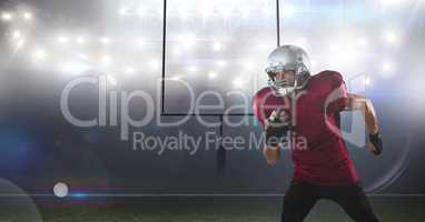 american football  player standing in front of the goal