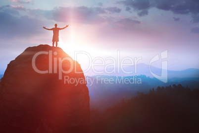 Composite image of shadow of men standing and raising arms