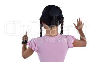 Girl using virtual reality headset against white background