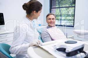 Female doctor discussing with patient