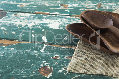 Various wooden scoop on table