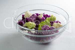 Cauliflowers with red cabbages in bowl