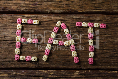 Honeycomb cereal arranged eat text