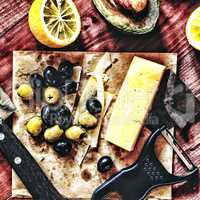 Wine snacks.  Olives, cheese, avocado, lemon