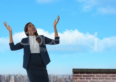 Businesswoman opening arms up to the sky confused and disappointed