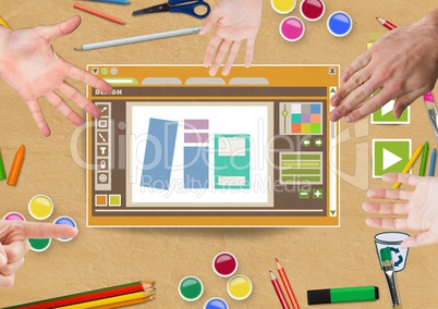 Hands touching Design editor window and creative art objects on Paper cut out desktop