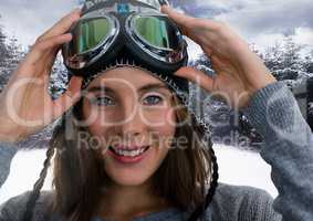 Woman in Winter with ski glasses in snow landscape