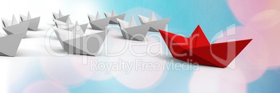 Group of Paper boats on bokeh background